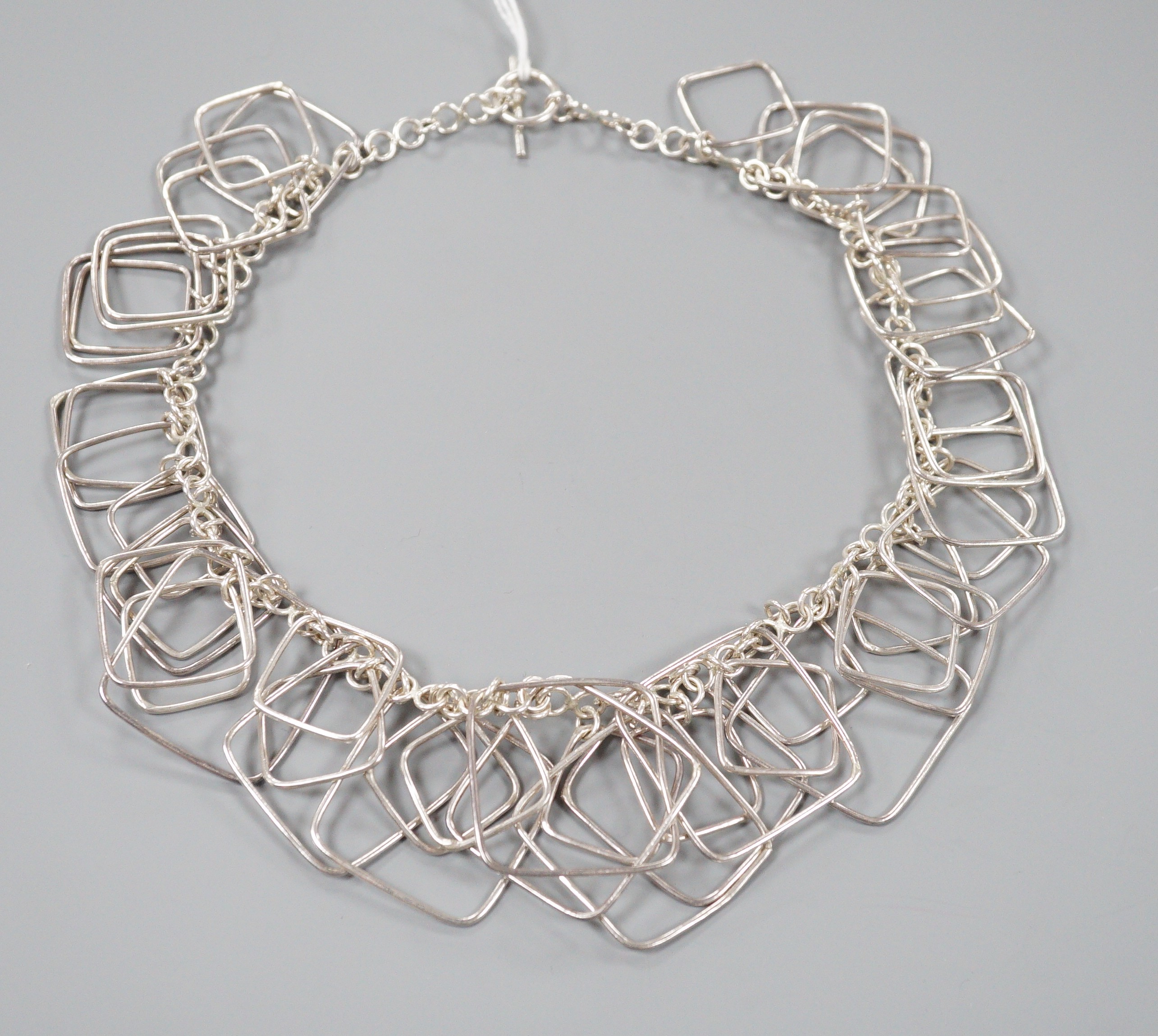 A stylish 1960's Scandinavian white metal multi graduated square link necklace, approx. 48cm, 107 grams.